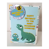 Dinosaur birthday card with badge, customised cards at Camieroseuk